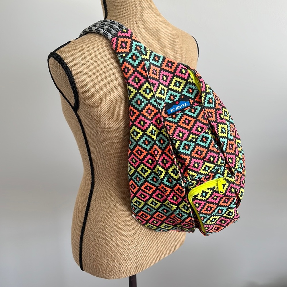Kavu Multicolor Geo Pattern Sling Backpack with Neon Yellow Accent